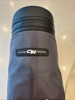 Outdoor Research Gray and Black Textured bottle insulater.